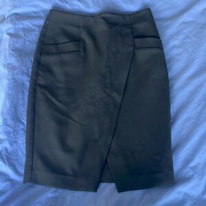 The LOFT black pencil skirt in size 0. Perfect as workwear.
